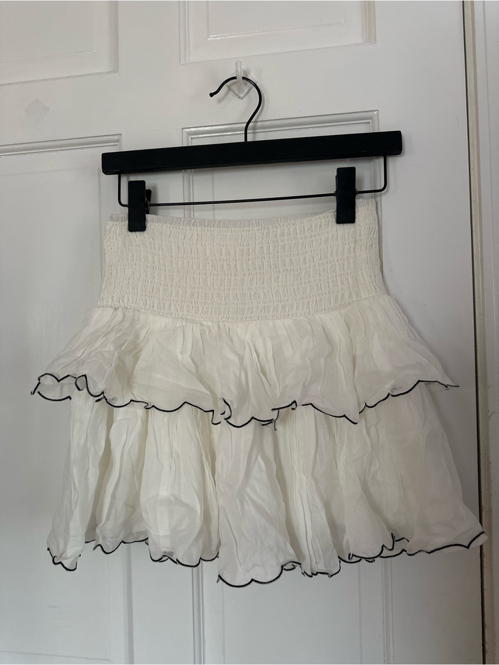 Francesca’s white ruffle skirt